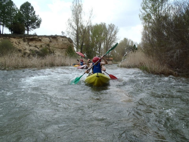  Two minors in a canoe for two on the Jucar River 
